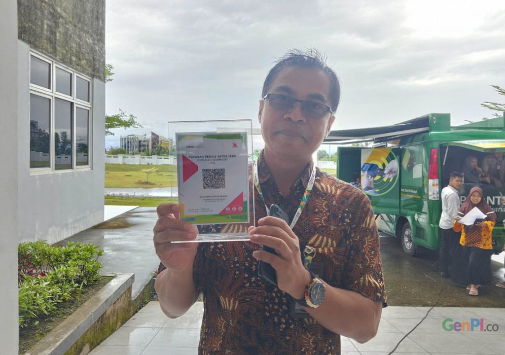 uploads/ntb/arsip/watermark/2023/04/14/kepala-bank-ntb-syariah-cabang-lombok-tengah-lalu-indra-jaya-zkrp.jpg - GenPI.co NTB