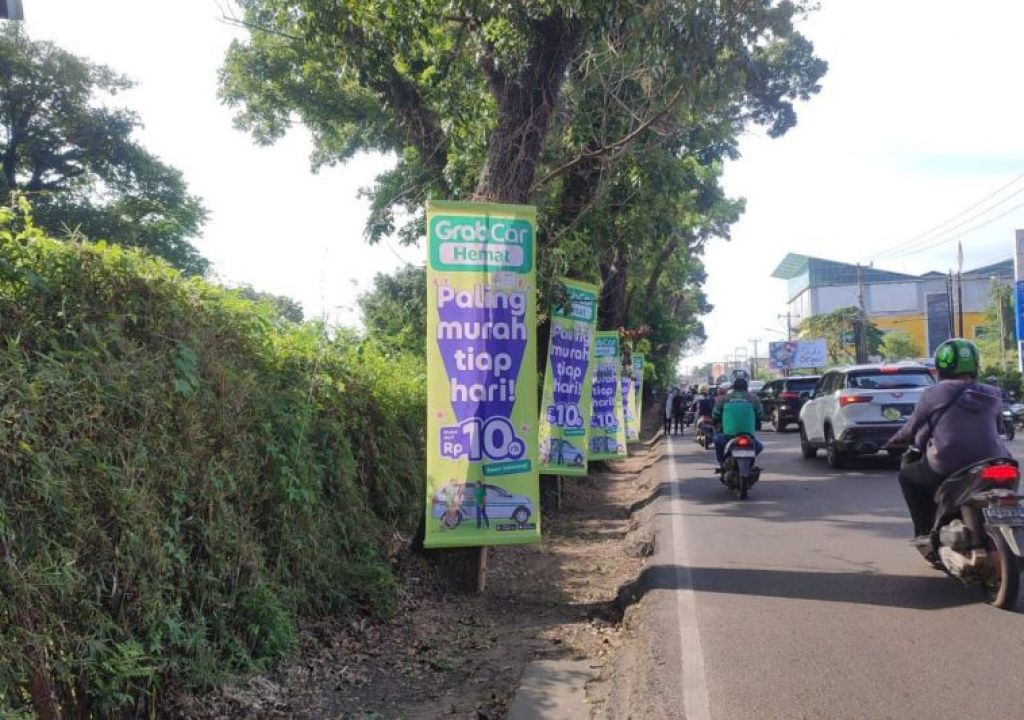 Pemkot Palembang Diminta Tertibkan Media Promosi di Pohon - GenPI.co SUMSEL