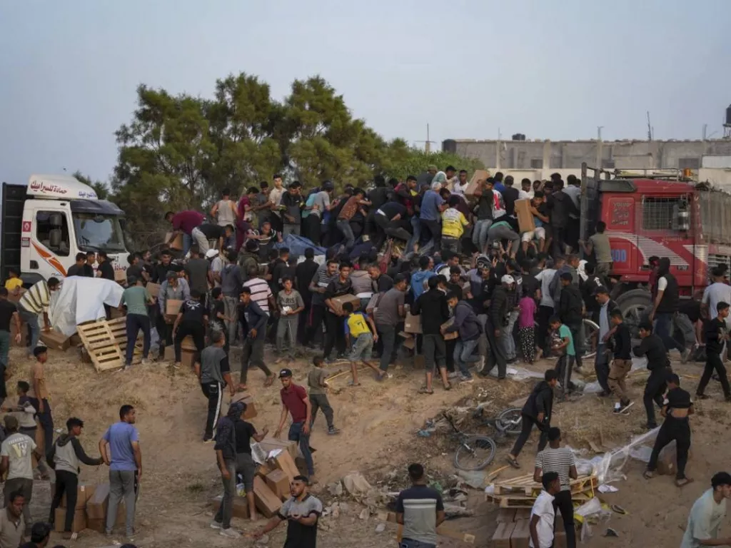 Pelanggaran Hukum dan Penjarahan Ala Geng Menghalangi Penyaluran Bantuan di Gaza - GenPI.co NTB