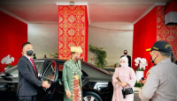 Presiden Jokowi Kenakan Pakaian Adat Bangka Belitung, Ini Maknanya - GenPI.co