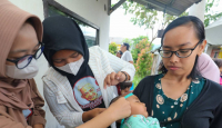 Resmikan Kampung Kolaborasi, GMC Bogor Beri Paket Gizi ke Balita - GenPI.co