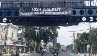 KPU Kota Malang Respons Soal Spanduk Ajakan Golput Pemilu 2024 - GenPI.co