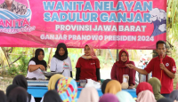 Bantu Ekonomi Warga, Wanita Nelayan Sadulur Ganjar Produksi Keripik Kelapa - GenPI.co
