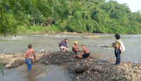 Air Sungai Ciliwung di Bogor Berbusa, DLH Ungkap Penyebabnya - GenPI.co
