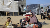 Israel Menyerang Rafah, Warga Gaza Tinggal di Tenda dan Mencari Makanan - GenPI.co