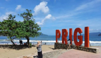 Pantai Prigi Sepi, Pengunjung Lebih Memilih Melihat Dampak Banjir - GenPI.co Jatim