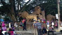Juragan 99 Bantu Renovasi Patung Singa di Malang Raya - GenPI.co Jatim