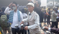 Pecinta Sepeda Tua Curi Perhatian di CFD Tunjungan, Gayanya Khas - GenPI.co Jatim