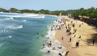 Turis di Pantai Wediombo Gunungkidul Bisa Nikmati Internet Gratis - GenPI.co Jogja
