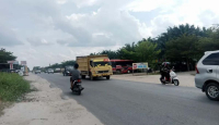 Warga Keluhkan Jalan Kubang di Perbatasan Pekanbaru Bergelombang - GenPI.co Riau