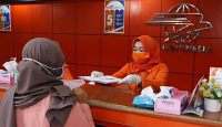 Kirim Paspor ke Pelosok, Kantor Imigrasi Palembang Gandeng Pos Indoneisa - GenPI.co Sumsel