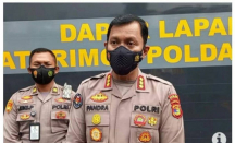 Kasus Penembakan Sesama Polisi, Kapolsek Way Pengubuan Dicopot - GenPI.co