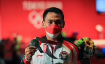 Sabet 3 Medali di Kejuaraan Dunia Angkat Besi, Eko Yuli Mengaku Belum Puas - GenPI.co