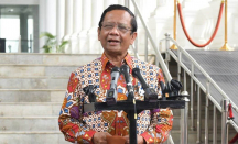 Disebut Jokowi Cawapres Ganjar Pranowo, Mahfud MD: Baru Lempar Bola - GenPI.co