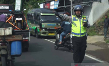 Polisi Urai Kemacetan Arus Mudik di Jalur Garut Jawa Barat - GenPI.co