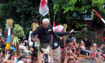 Hajatan Rakyat di Surakarta, Ganjar Pranowo Ikut Kirab Gerobak Sapi - GenPI.co