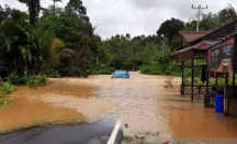 Banjir Genangi Jalan Menuju Perbatasan Indonesia-Malaysia di Kalimantan Barat - GenPI.co