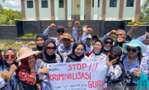 Jalani Sidang Perdana Kasus Kekerasan Siswa, Supriyani Dapat Dukungan Ribuan Guru di Konawe Selatan - GenPI.co