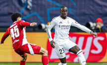 Real Madrid Lolos ke Babak 8 Besar Liga Champions, Ferland Mendy Jadi Tumbal - GenPI.co