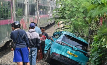 Puslabfor Dalami Penyebab Matinya Mesin Taksi Listrik Green SM di Perlintasan Kereta - GenPI.co