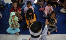 Musik Bisa Picu Perkembangan Otak Anak, Penting untuk 1.000 Hari Pertama Kehidupan - GenPI.co