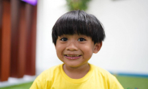 Tips Mencegah Gigi Anak Berlubang, Batasi Asupan Gula - GenPI.co