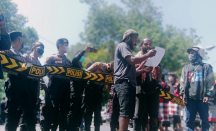 Demo Dikawal Polisi, AMP Bali Tuntut 12 Hal Ini - GenPI.co Bali