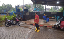 Kota Tangerang Diguyur Hujan Sejak Pagi, Petugas BPBD Siaga - GenPI.co Banten