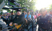 Tampil Nyeleneh! Gibran Pakai Kostum Tukang Parkir di Pawai Pembangunan Kota Solo - GenPI.co Jateng