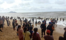 Bocah Terseret Ombak di Pantai Pasir Panjang Diselamatkan Anggota Brimob Singkawang - GenPI.co Kalbar