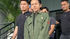 Ditangkap Polisi, Epy Kusnandar Pamer Senyum - GenPI.co