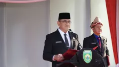 Irup Hardiknas, Sekda Sumsel Edward Candra Bacakan Amanat Tertulis Mandikdasmen RI - GenPI.co