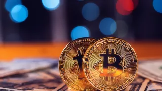 btc į USD