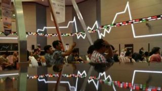 IHSG Bergerak Positif, Pasar Nantikan Kebijakan Moneter BI - GenPI.co