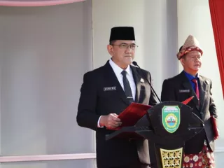Irup Hardiknas, Sekda Sumsel Edward Candra Bacakan Amanat Tertulis Mandikdasmen RI - GenPI.co