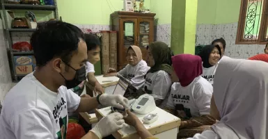 Dorong Indonesia Sehat, Santri Dukung Ganjar Disambut Antusias Warga