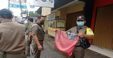 Bendera Ormas di Kecamatan Cipondoh Diturunkan Pihak Keamanan