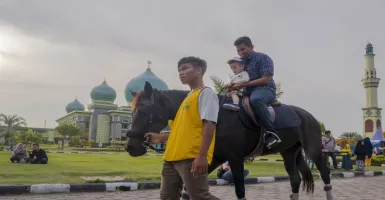 Pentingnya Pemandu Wisata Halal di Riau