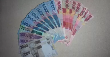 Rupiah Kembali Tertekan, Balik Tembus Rp 14.300/USD