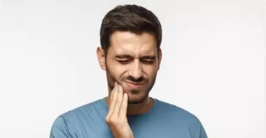 Bahaya! Sakit Gigi Bisa Ganggu Kesuburan Pria lho