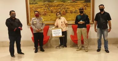 Lawan Corona, Sinar Mas Land Serahkan Ribuan Masker ke TNI/Polri