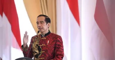 Makna Busana Cheongsam yang Dikenakan Jokowi Saat Perayaan Imlek