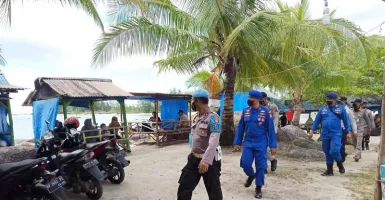 Polisi Jalan Kaki Keliling Pantai Trikora, dalam Rangka Apa?