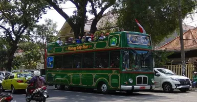 Wisatawan Keliling Kota Malang Gratis Naik Bus Macito