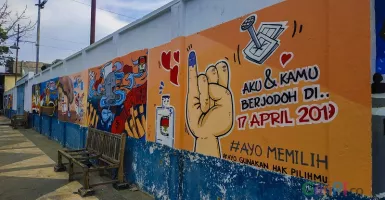 Melalui Karya Mural, Seniman Riau Ajak Masyarakat Tidak Golput