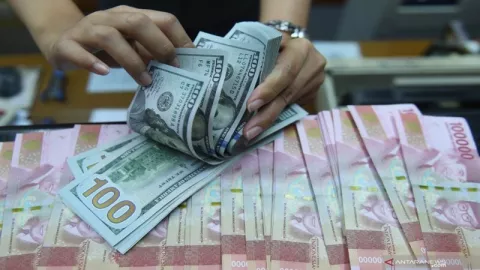 Fokus Pasar Uang Belum Beringsut dari Timteng, Kurs Rp14.100/USD - GenPI.co