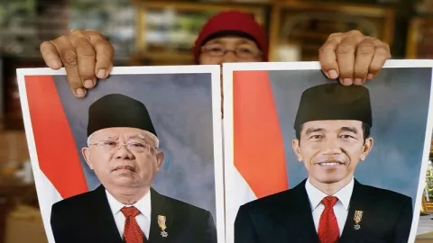 Pedagang Jual Foto Jokowi-Ma'ruf Berbeda yang Dikeluarkan Setneg - GenPI.co