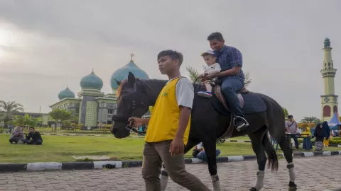Pentingnya Pemandu Wisata Halal di Riau - GenPI.co