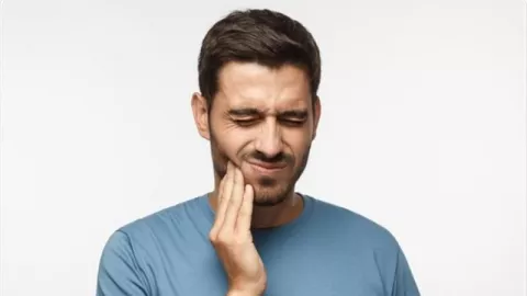 Bahaya! Sakit Gigi Bisa Ganggu Kesuburan Pria lho - GenPI.co