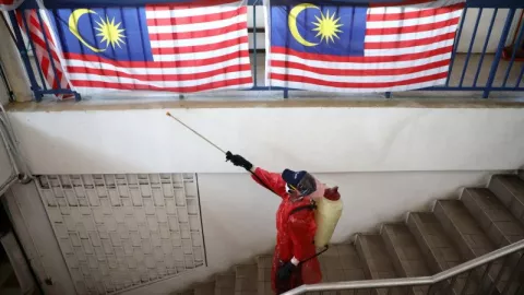 Malaysia Resmi Kurangi Masa Karantina Wajib Covid-19 Jadi 10 Hari - GenPI.co